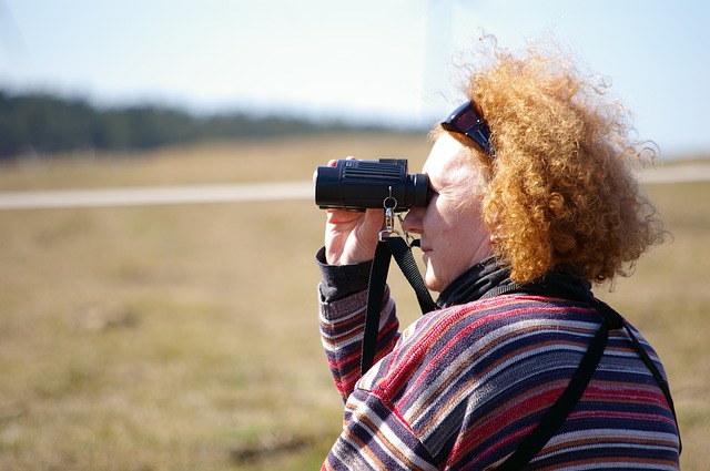 Older Woman Looking Through Binaculars