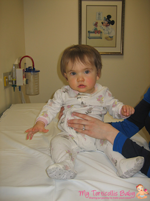 Baby on exam table at torticollis clinic at Children's National Medical Center