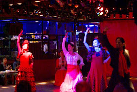 four Flamenco dancers performing at nightclub