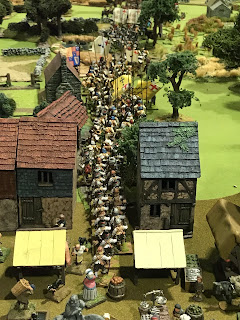 A line of troops heads to the front