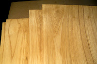 Close Up of Several 4x8 Wood On Wood Teak Veneer