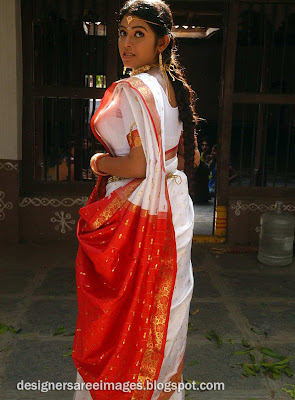 Actress Prathishta in White Colour Bridal Silk Saree