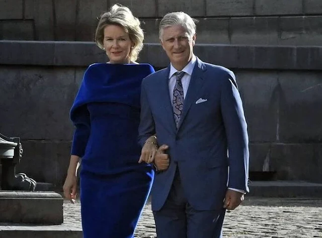 Queen Mathilde wore a royal blue midi dress by Natan. King Philippe hosted a reception for mayors of cities and municipalities