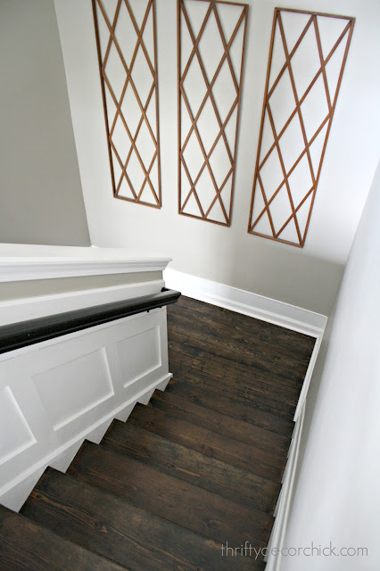 Dark wood steps, white trim