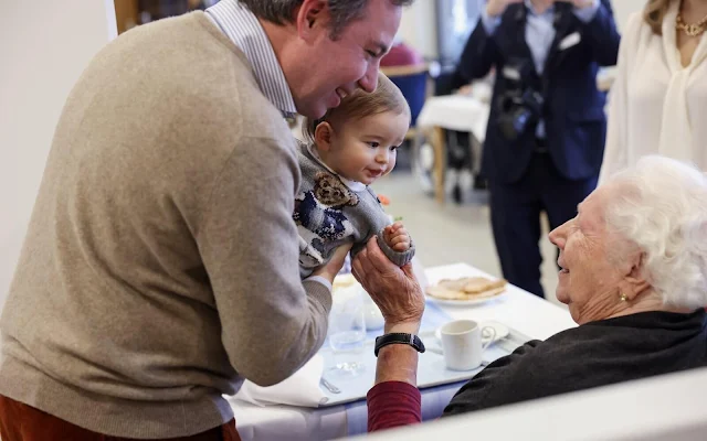 Princess Stephanie is wearing silk crepe de chine Tova trousers by Joseph Fashion, and white silk blouse by Natan