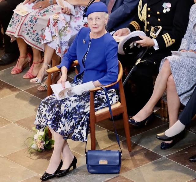The Queen wore a blue floral print dress. The celebration service was also a farewell service for Bishop Peter Fischer-Møller