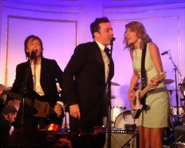 This is one selfishly that's going to get a lot of likes.  Because Taylor Swift just one woman between a lot of man as she headed into the SNL 40th anniversary after-party at The Plaza Hotel in New York City on Sunday, February 15, 2015.  What better way to end a great night than collective? The 25-year-old's white dress pulled together on stage with Sir Paul McCartney and Jimmy Fallon to singing a series of the Beatles music collection.