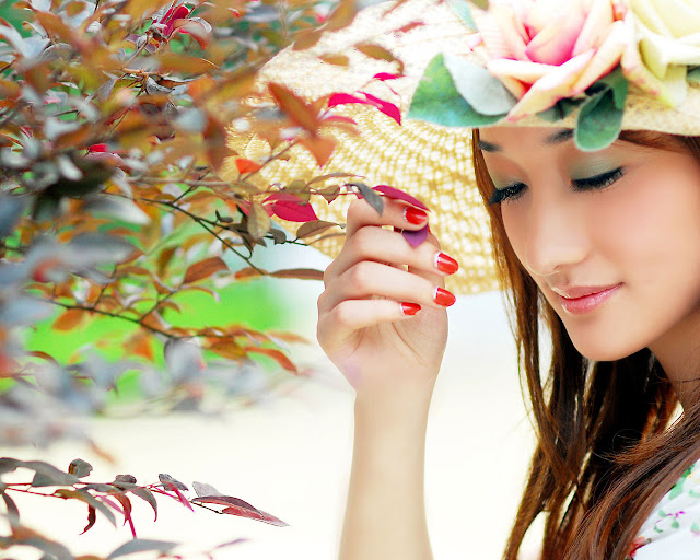 Lovely Girl in Colorful Garden