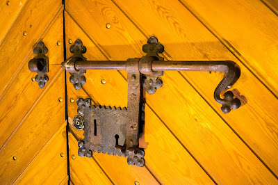 Photo of the old and the new lock on a gate