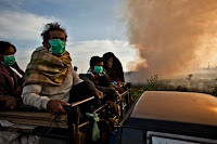  Air pollution in Sumatra in 2013, where peatlands were burned to clear land for a palm-oil plantation. (Credit: Ulet Infansasti/Greenpeace) Click to Enlarge.