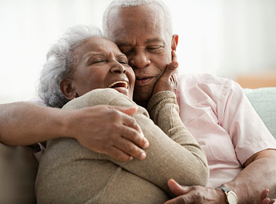 elderly_black_couple_hugging.jpg