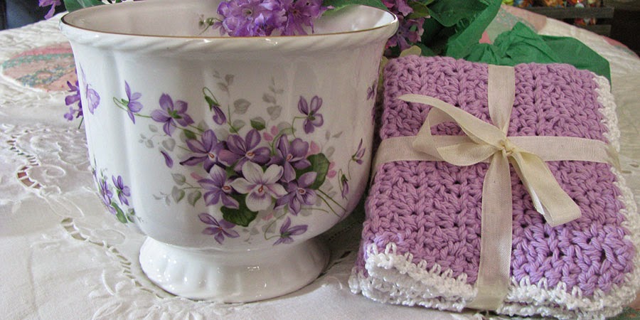 http://www.cottageviolets.com/item_182/Aynsley-Wild-Violets-Cachepot.htm