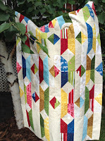 http://quiltersenjoycolor.blogspot.ca/2016/08/split-triangle-row-quilt-step-1.html