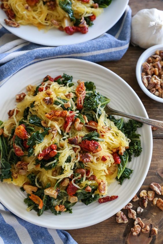 Roasted Garlic and Kale Spaghetti Squash - Roasted garlic and kale spaghetti squash with sun-dried tomatoes and walnuts makes for a comforting, low-carb meal requiring only 5 main ingredients! Plus the recipe is simple to prepare! Roasted Garlic and Kale Spaghetti Squash - Roasted garlic and kale spaghetti squash with sun-dried tomatoes and walnuts makes for a comforting, low-carb meal requiring only 5 main ingredients! Plus the recipe is simple to prepare!