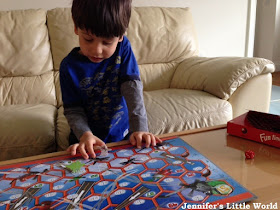 Child playing a board game