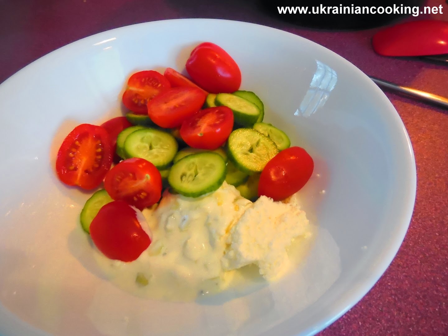 Very common Ukrainian salad is cottage cheese, sour creme and cucumbers