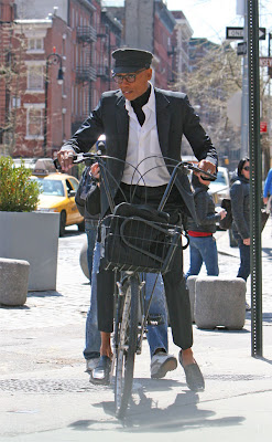 RuPaul on a bike in Manhattan