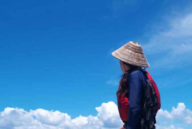 Woman at sea looking westward, Wordless Wednesday