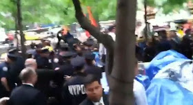 World Revolution American Revolution Directly from New York USA America Breaking News occupy Wall Street news Not Seen on FOX, CNN, NBC, BBC, NYPD Arrest protesters drag by their legs bleeding due Fascist NAZI New World Order police