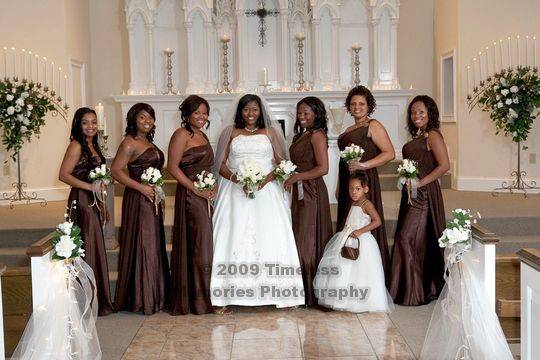 The Groomsmen wore tan tuxedos with chocolate vests and chocolate shoes