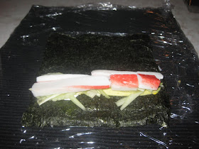 how to roll california rolls, roll in rice, seaweed, nori, crab, cucumber