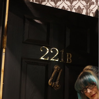 Peeking out of door 221B Baker Street  Sherlock Holmes