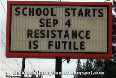 School starts, resistance is futile billboard sign