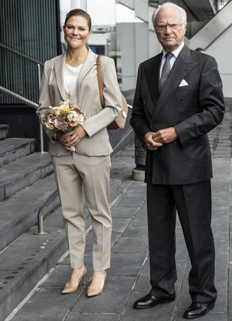 Crown Princess Victoria wore a beige Sasha wool blazer by Filippa K. Little Liffner crossbody bag