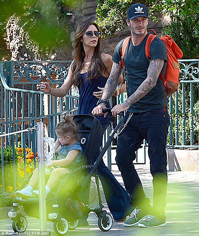 Victoria Beckham in Flares and Heels at Disneyland