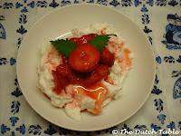 Hangop on plate with fresh strawberries