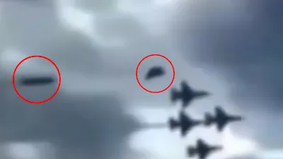 Circled in red are two UFOs at an air display show.