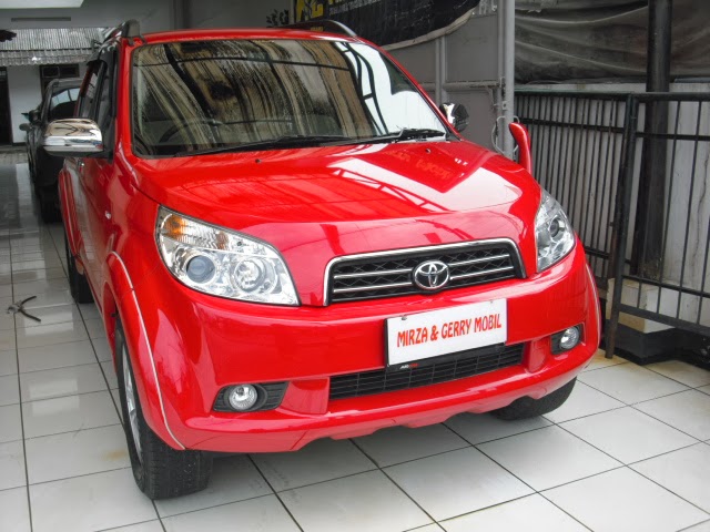 Mirza Gerry Mobil  TOYOTA  RUSH  S A T MERAH METALIK 2009