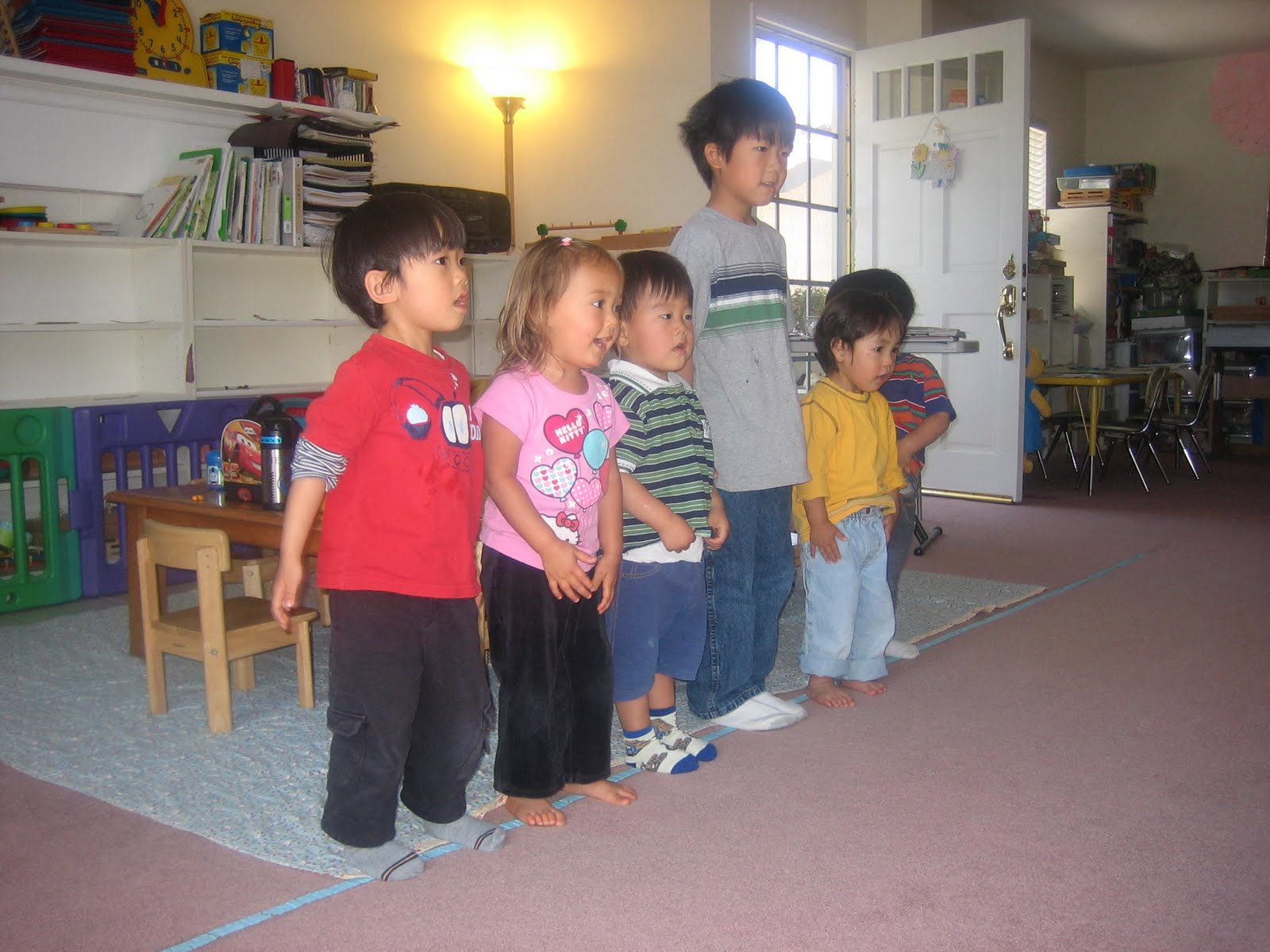 More preschool pictures...Miya being a good girl and finally standing ...