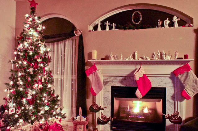 decorated Christmas tree and mantle with stocking photo by mbgphoto