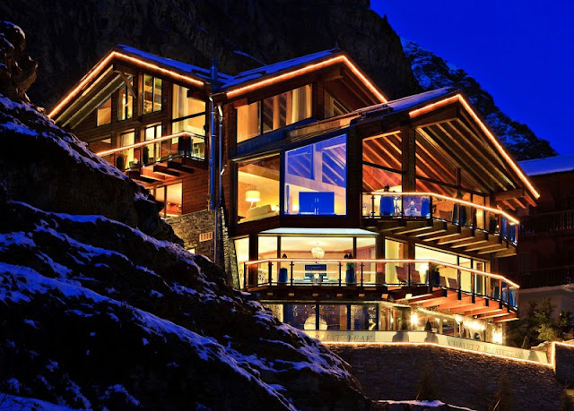 Picture of large mountain home at night
