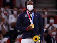 Judo legend Clarisse Agbegnenou wins gold for France in women’s -63kg.