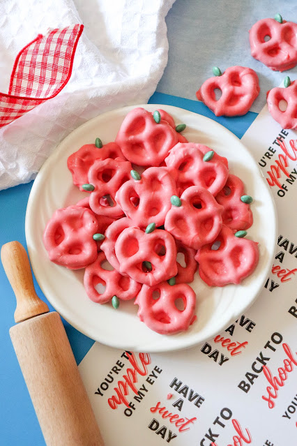 pretzels on a white plate with white, red and blue background.