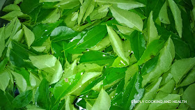 Wash curry leaves