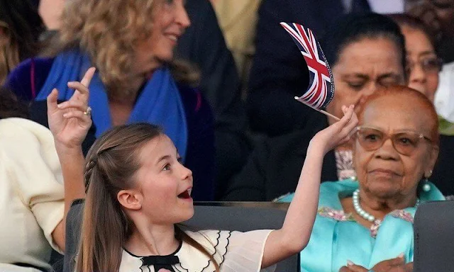 Alexander McQueen suit, Beulah Yahvi dress, Princess Charlotte in Self-Portrait dress. Zara Tindall, Princess Eugenie. Queen Camilla