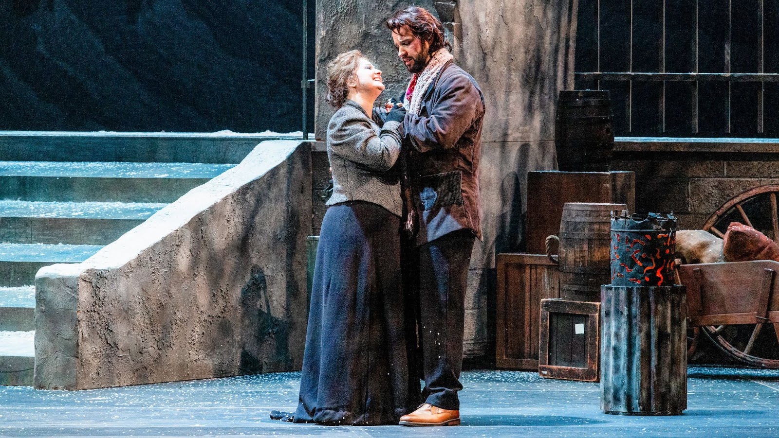 IN REVIEW: soprano STEFANNA KYBALOVA as Mimì (left) and tenor ADAM SMITH as Rodolfo (right) in Opera Carolina's January 2020 production of Giacomo Puccini's LA BOHÈME [Photograph by Mitchell Kearney, © by Opera Carolina]