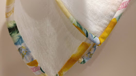 Use extra quilt binding to add an accent to tea towels!