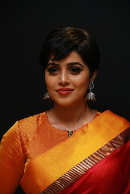 Poorna telugu actress hot images in red color saree