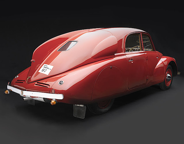 a 1938 Tatra in red, a color photograph