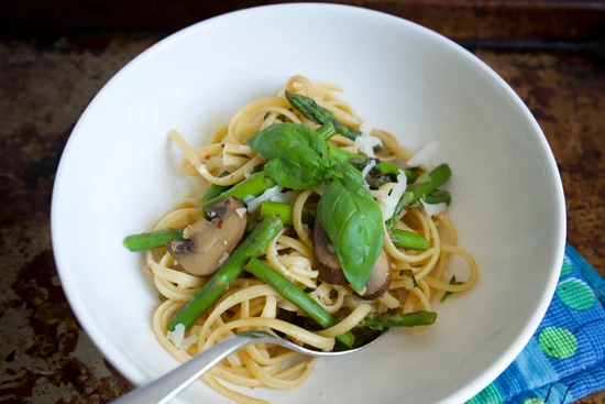 A bowl of Pasta with Fresh Basil and Asparagus