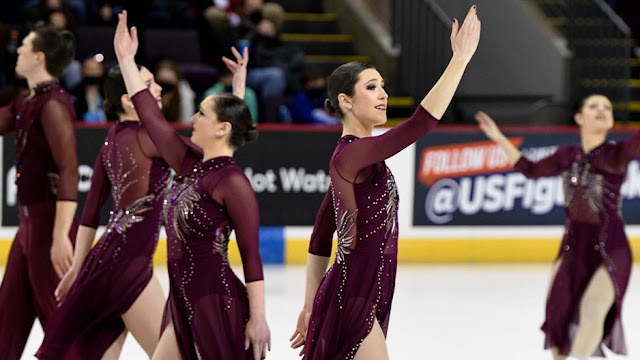 Women figure skating. Caption: Army 2nd Lt. Ava Dimmick, a world-class synchronized ice skater, is a member of the Hebert School of Medicine class of 2026 at the Uniformed Services University of the Health Sciences (USU).  (Photo credit: Army 2nd Lt. Ava Dimmick and  KR Photos)