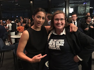 Kate Jenkins and her crazy eyes wearing her "Wen you laugh togetha cos you know ur gonna smash the patriarchy" shirt.