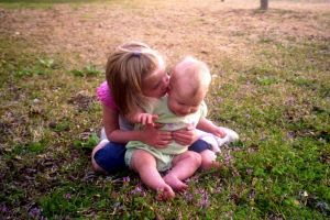 My girls - sisters in the grass - Stock Photo credit: jamocha76