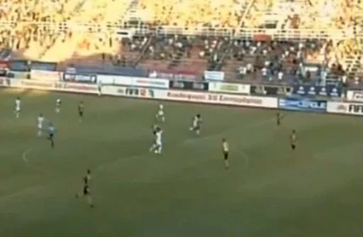 Panionios player Sito Riera shoots to score a goal from halfway line against Ergotelis
