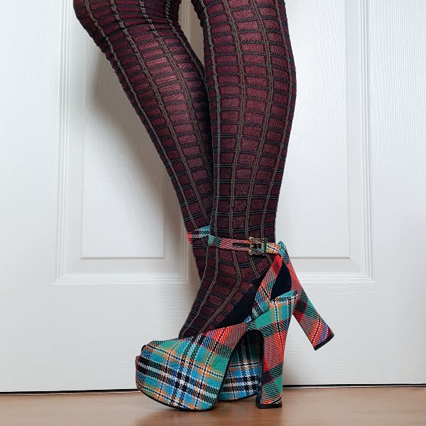 wearing colourful tartan Vivienne Westwood shoes with Prada tights