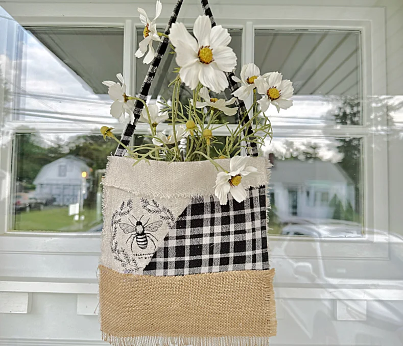 flower pocket with flowers on front door